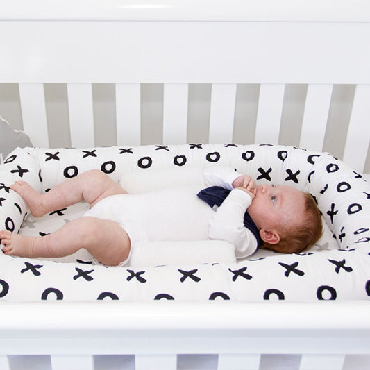 Babyhood Breathe Eze Sleep Positioner available at Bear & Moo