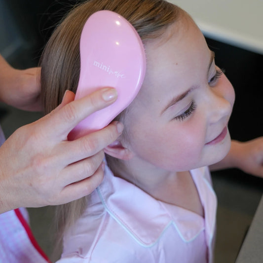 Mini Mane Mini Detangling Brush available at Bear & Moo