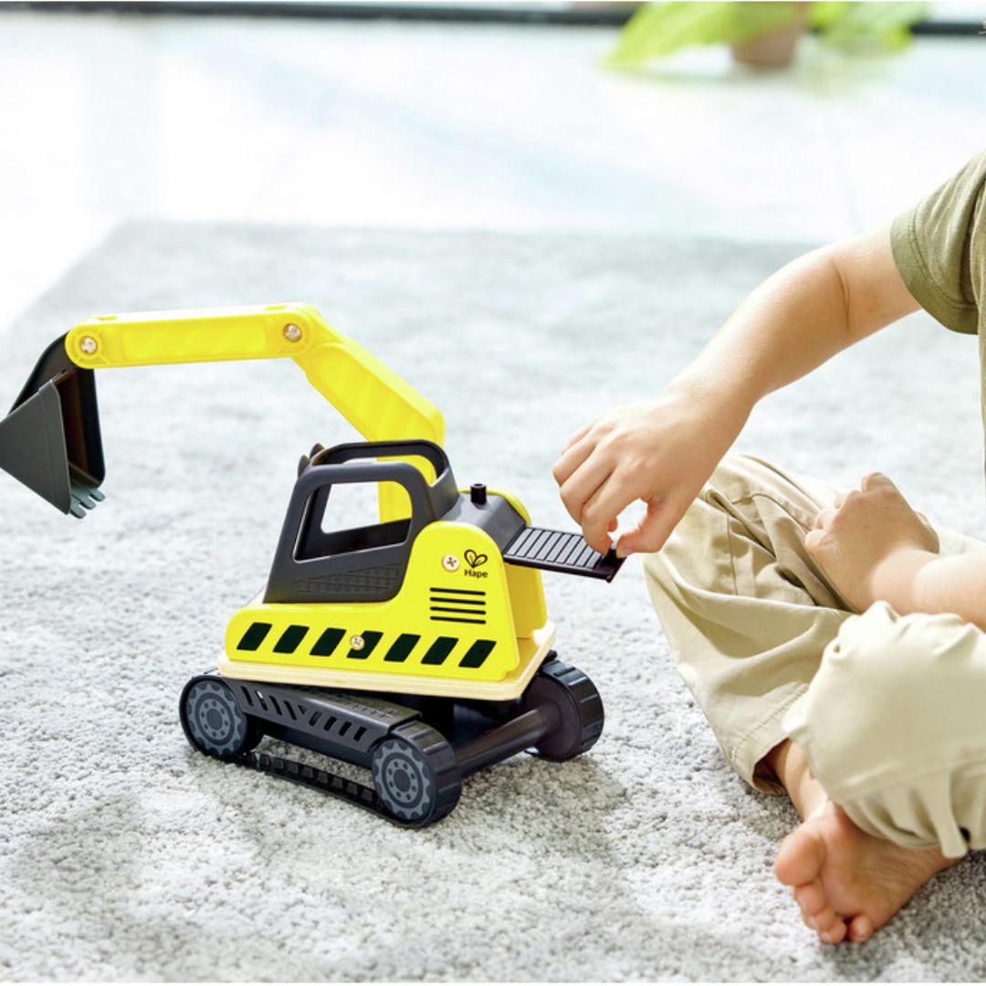 Hape Dig’N Dump Excavator available at Bear & Moo
