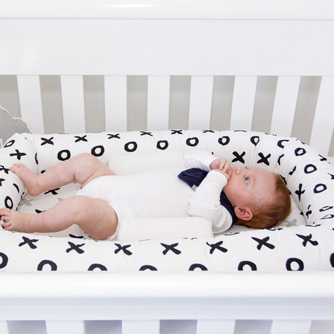 Babyhood Breathe Eze Sleep Positioner available at Bear & Moo