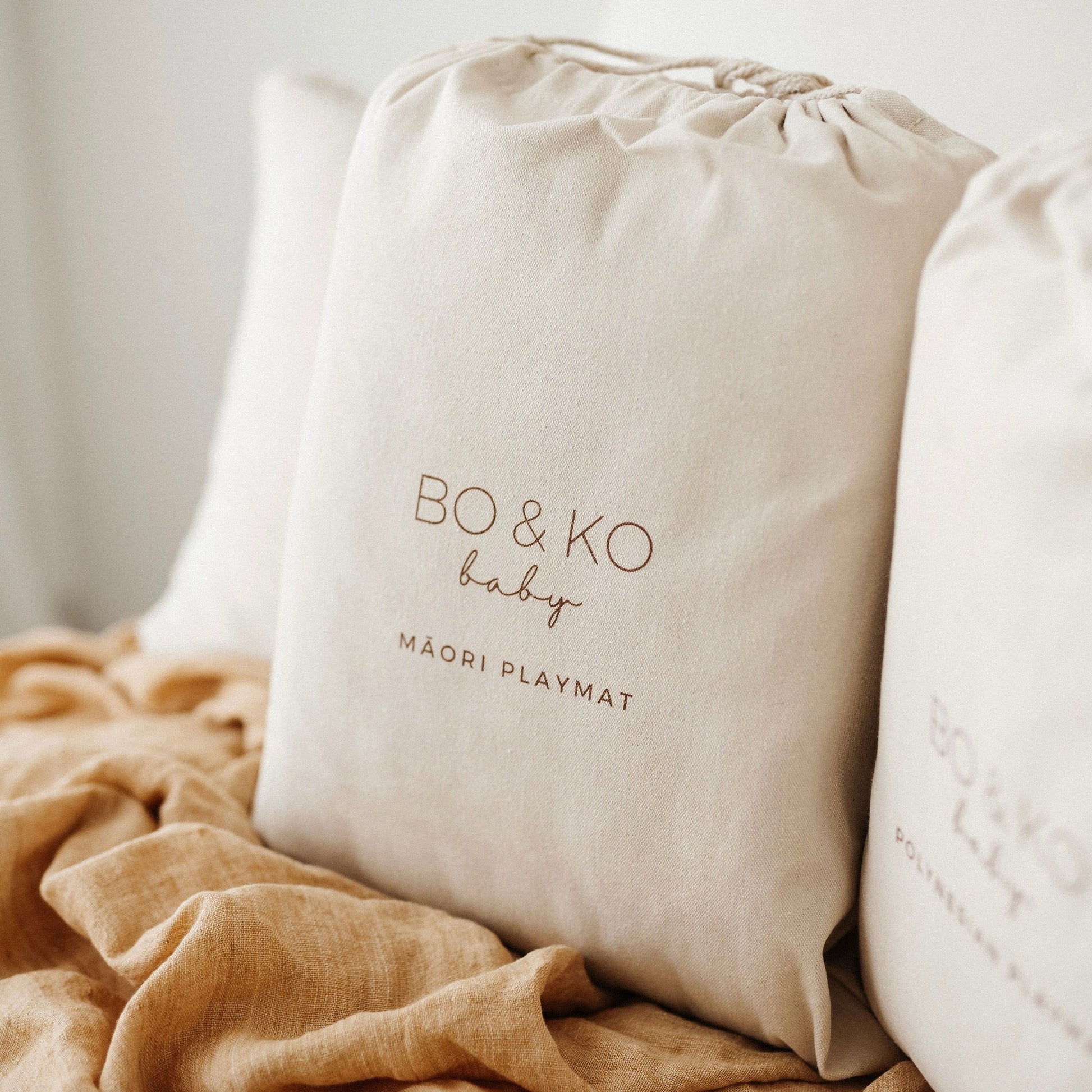 BO & KO Baby Māori Inspired Playmat | Mauve available at Bear & Moo