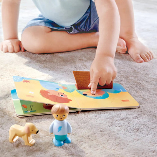 Hape Land | The Dog's New Friend Board Book & Toy figurines available at Bear & Moo