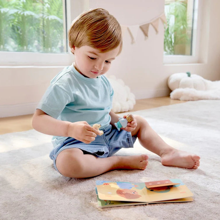 Hape Land | The Dog's New Friend Board Book & Toy figurines available at Bear & Moo