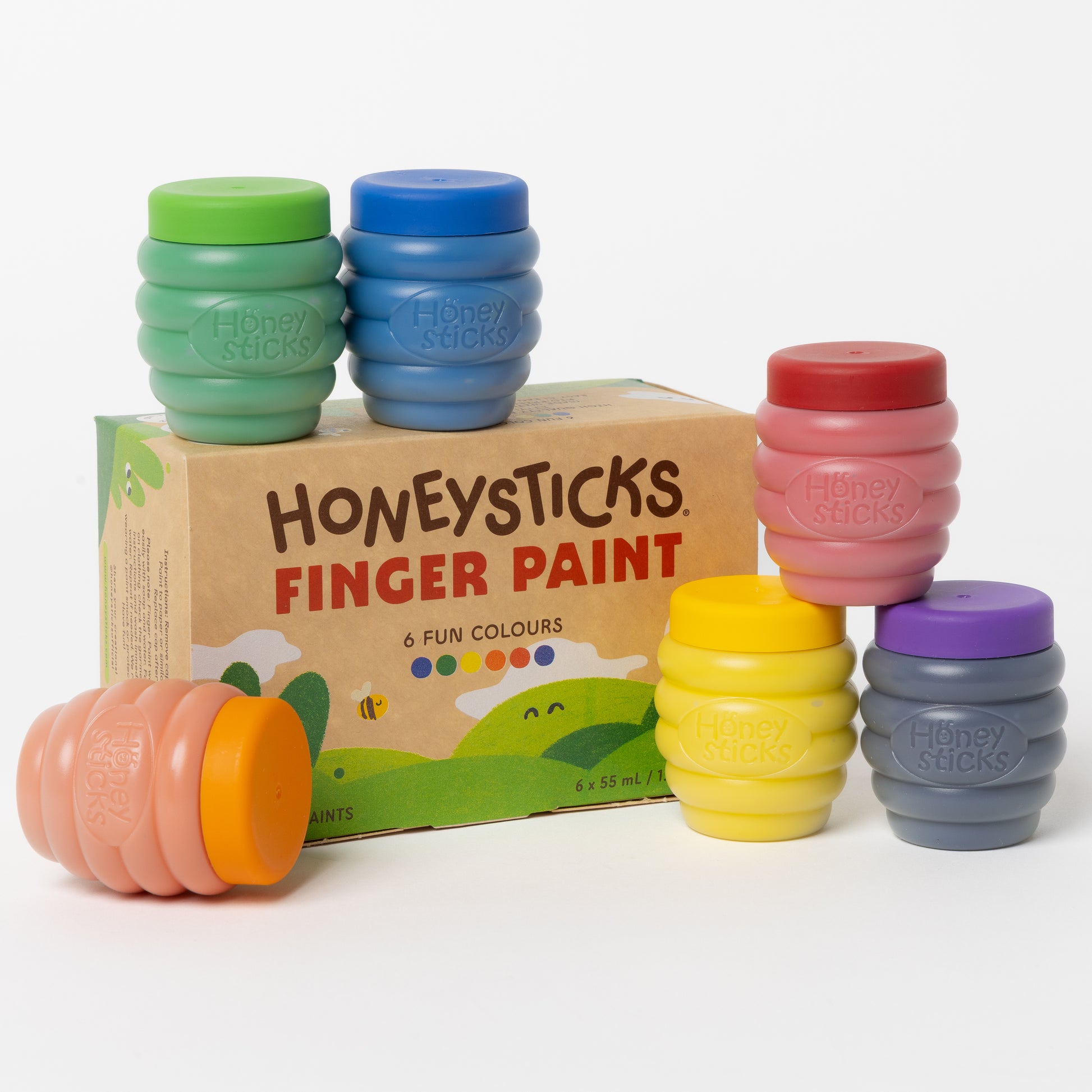 Set of Honeysticks finger paint containers with a cardboard box on a white background