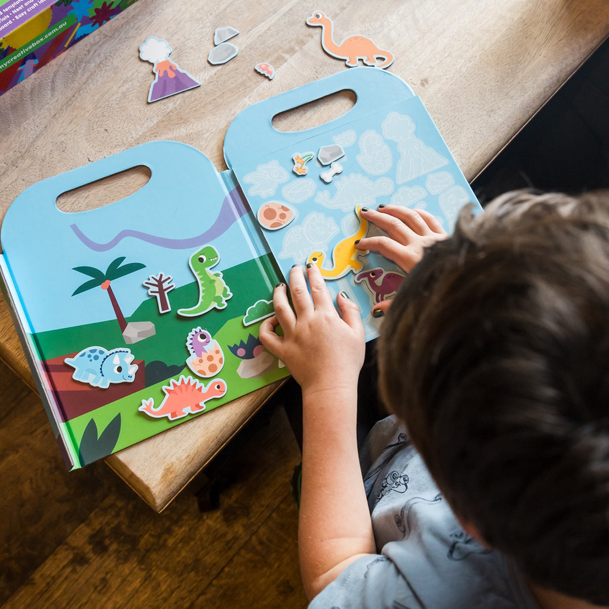 My Creative Box Dinosaur Magnetic Play Set, child playing with the dinosaur scene