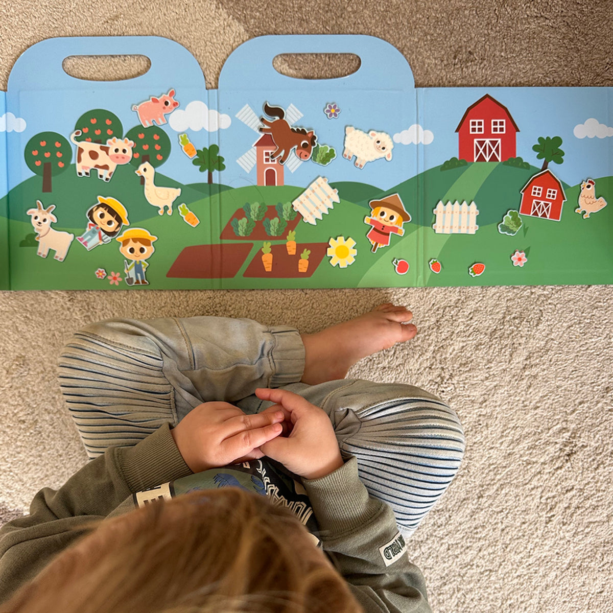 My Creative Box Farm Magnetic Play Set, child playing with the farm scene