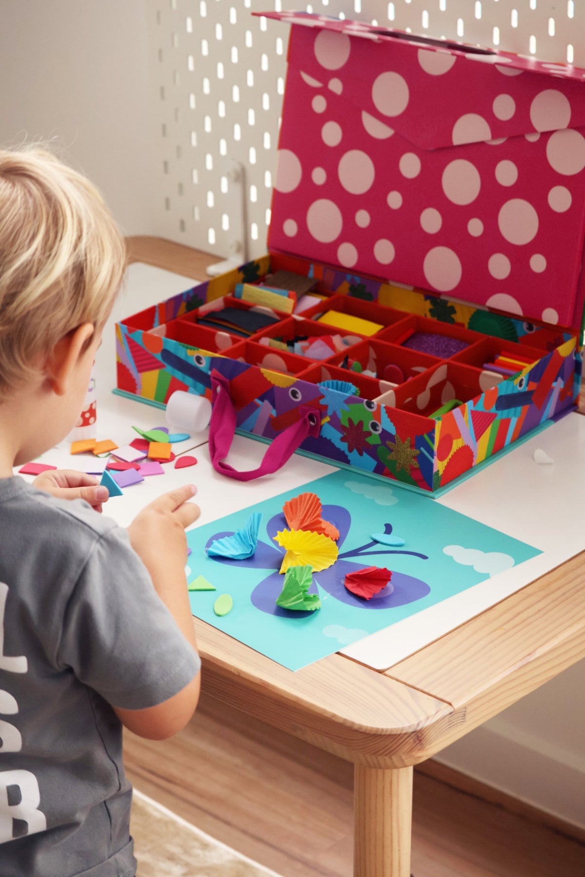 My Creative Box Unicorn and Fairy Collage Sensory Craft Box, child making a collage from a craft box